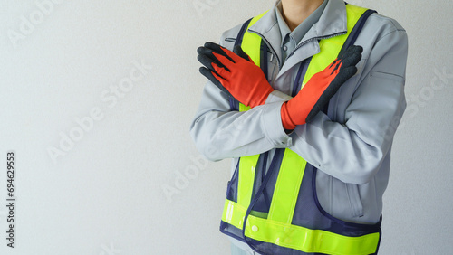 NGポーズ・作業服の男性・建設業イメージ