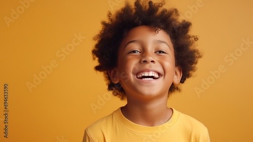 Laughing Black Boy isolated on Minimalist Background. DEIB, Diversity, Equity, Inclusion, Belonging 