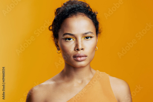 Woman colourful black creative smile portrait african face cosmetic beauty beautiful yellow make-up