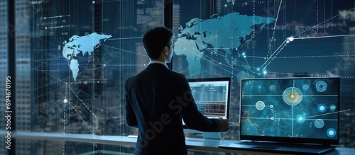 man working with computer and digital tablet and financial graph with social network diagram. photo