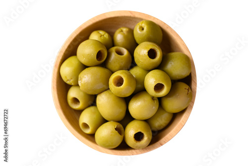 Pickled olives, Pitted green olives in wooden bowl, top view