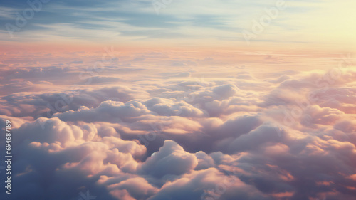Aerial footage of clouds at sunrise, Sun is rising above the endless sea of clouds until the horizon. Amazing nature landscape photo