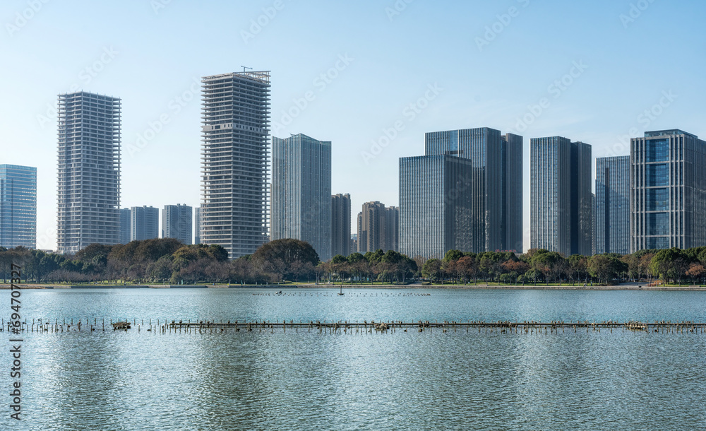 Fototapeta premium A modern city by the lake