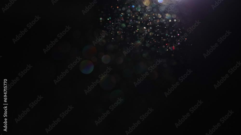 Motes of dust dancing in a ray of light