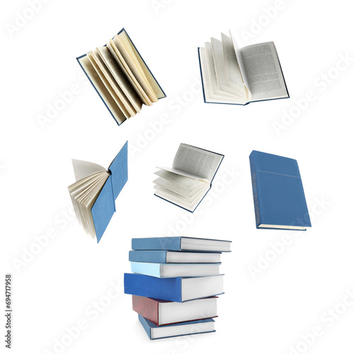 Books flying over stack on white background