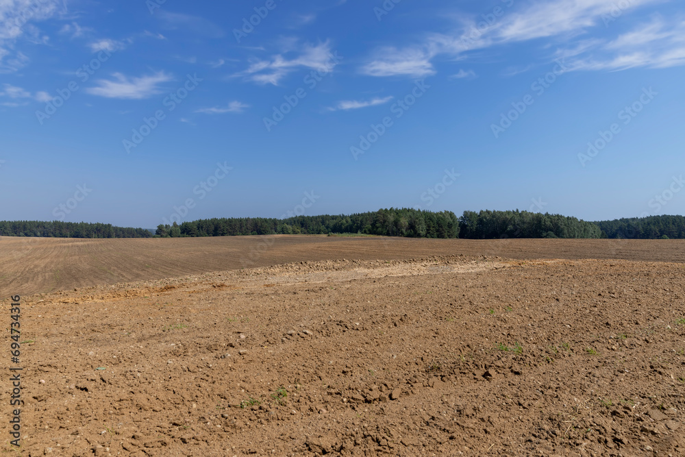 plowed soil in the field for sowing plants plowed soil in the field for sowing plants