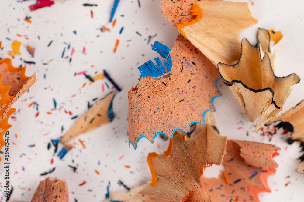 shavings and pieces of lead on paper after sharpening pencils shavings and pieces of lead on paper after sharpening pencils