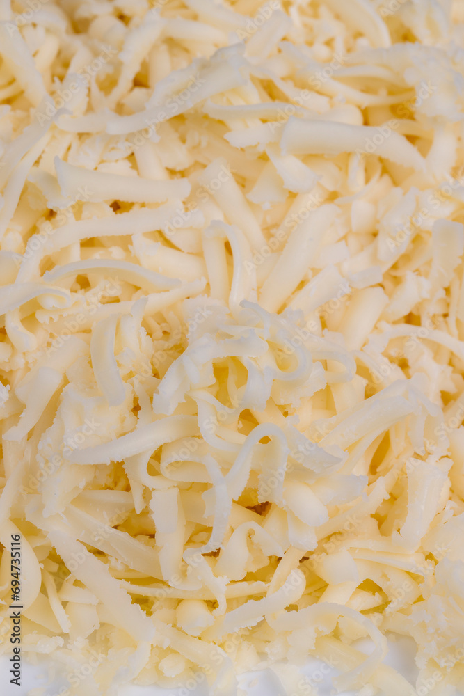 grated cheese in large quantities at home