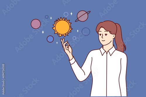 Woman studies outer space and solar system to make astrological forecast for future, dressed in business clothes. Planets and stars from space or neighboring galaxy near scientist girl