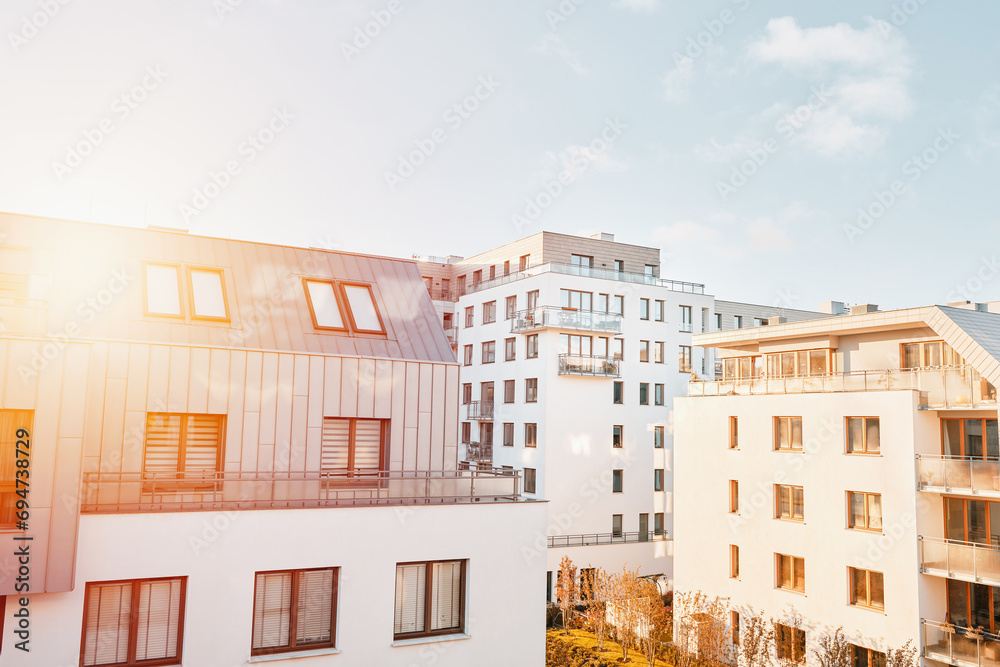 EU Modern European complex of apartment buildings and outdoor facilities. Condo exterior. White facade of a house.