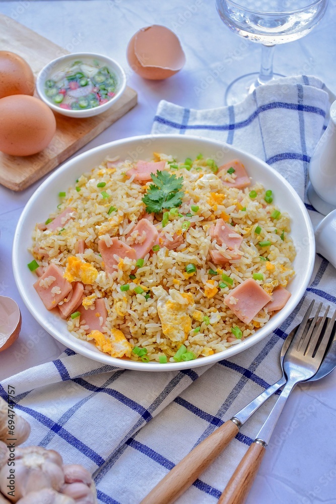 fried rice with ham and egg, on a white background,thai food,asian food, top view food table