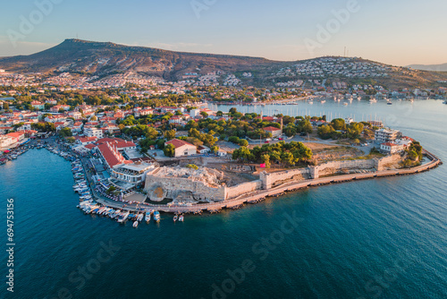 Ancient castle in Foca or Phokaia resort town in Izmir region at sunset, aerial view