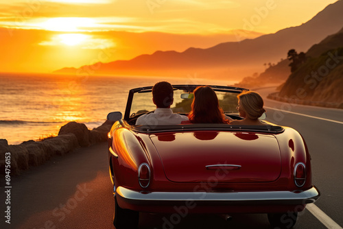 A couple in a convertible car driving down the road at sunset. Generative AI. © serg3d