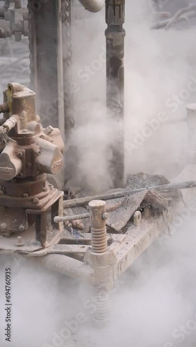 Harvesting Vitality Bore Well Drilling in an Indian Town, Drilling a bore well for water in the Indian town, Water well drilling rig preparing to boring dowin into the earth stock video photo