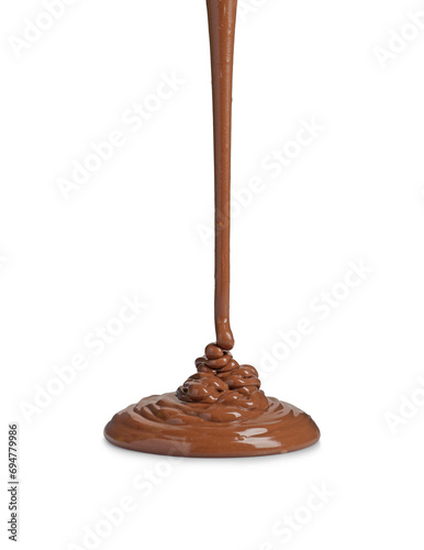 Pouring tasty melted milk chocolate isolated on white