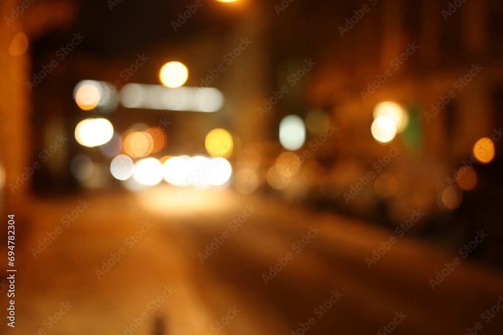 Blurred view of city street with snow