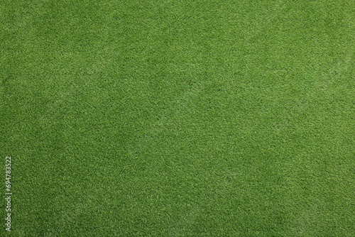 Green artificial grass as background, top view © New Africa