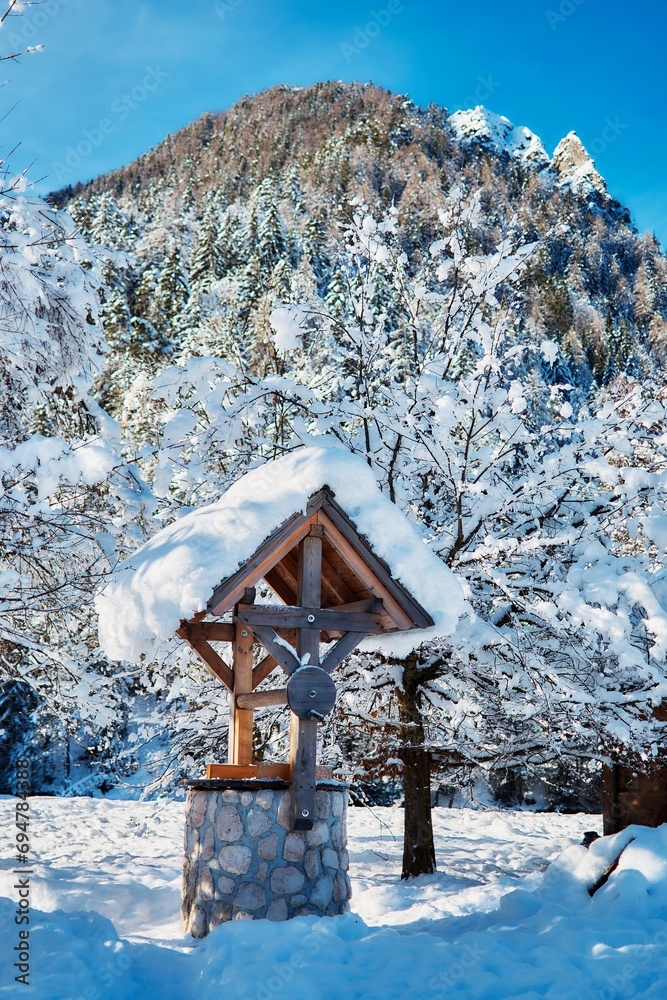 well under the snow in front of mountains well under the snow in front of mountains