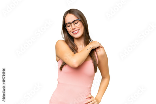 Young pretty caucasian woman over isolated background suffering from pain in shoulder for having made an effort