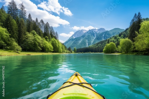 Kayaking adventure on a serene lake surrounded by green mountains, Generative AI © ManusiaIkan