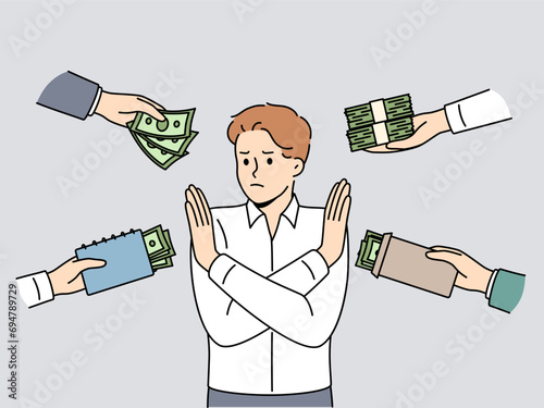 Man refuses monetary bribes by crossing arms in front of chest and not wanting to participate in illegal transactions. Anti-corruption guy calls for giving up bribes or undeserved enrichment