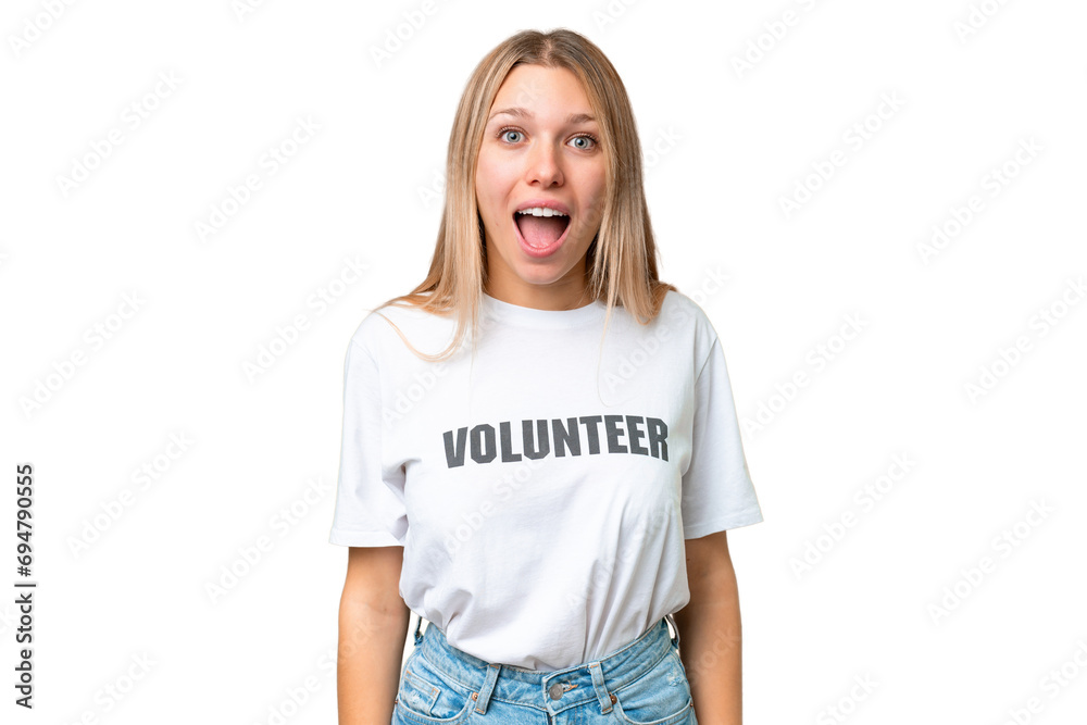 Young volunteer woman over isolated chroma key background with surprise facial expression Young volunteer woman over isolated chroma key background with surprise facial expression