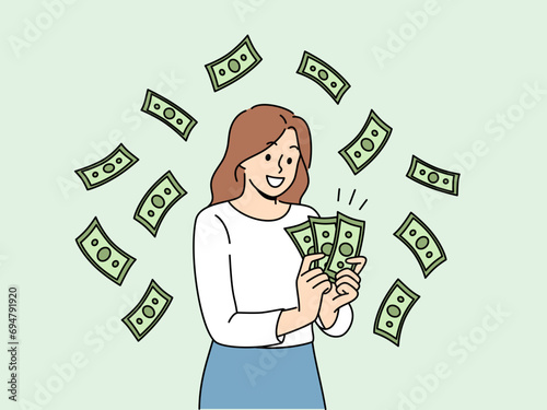Woman with money banknotes rejoices at receiving high income for work performed or services provided. Lucky girl won money jackpot in casino or got rich after participating in lottery
