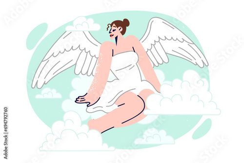 Woman with angel wings sits on clouds and looks to side, demonstrating serenity and peacefulness