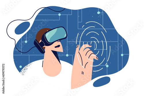 Man with VR headset on head smiles touching invisible screen visiting metaverse.