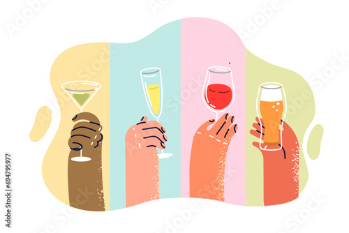 Glasses with different alcohol drinks in hands people, for advertising restaurant bar