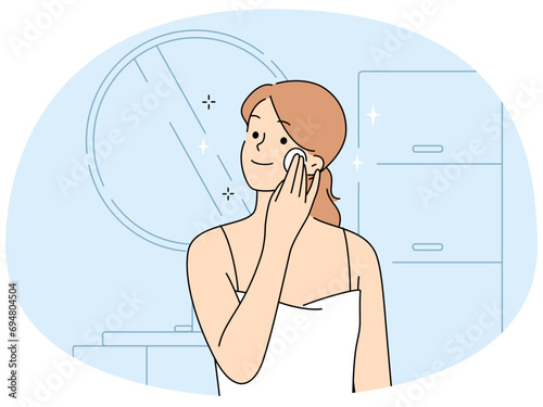 Woman do beauty procedures in bathroom