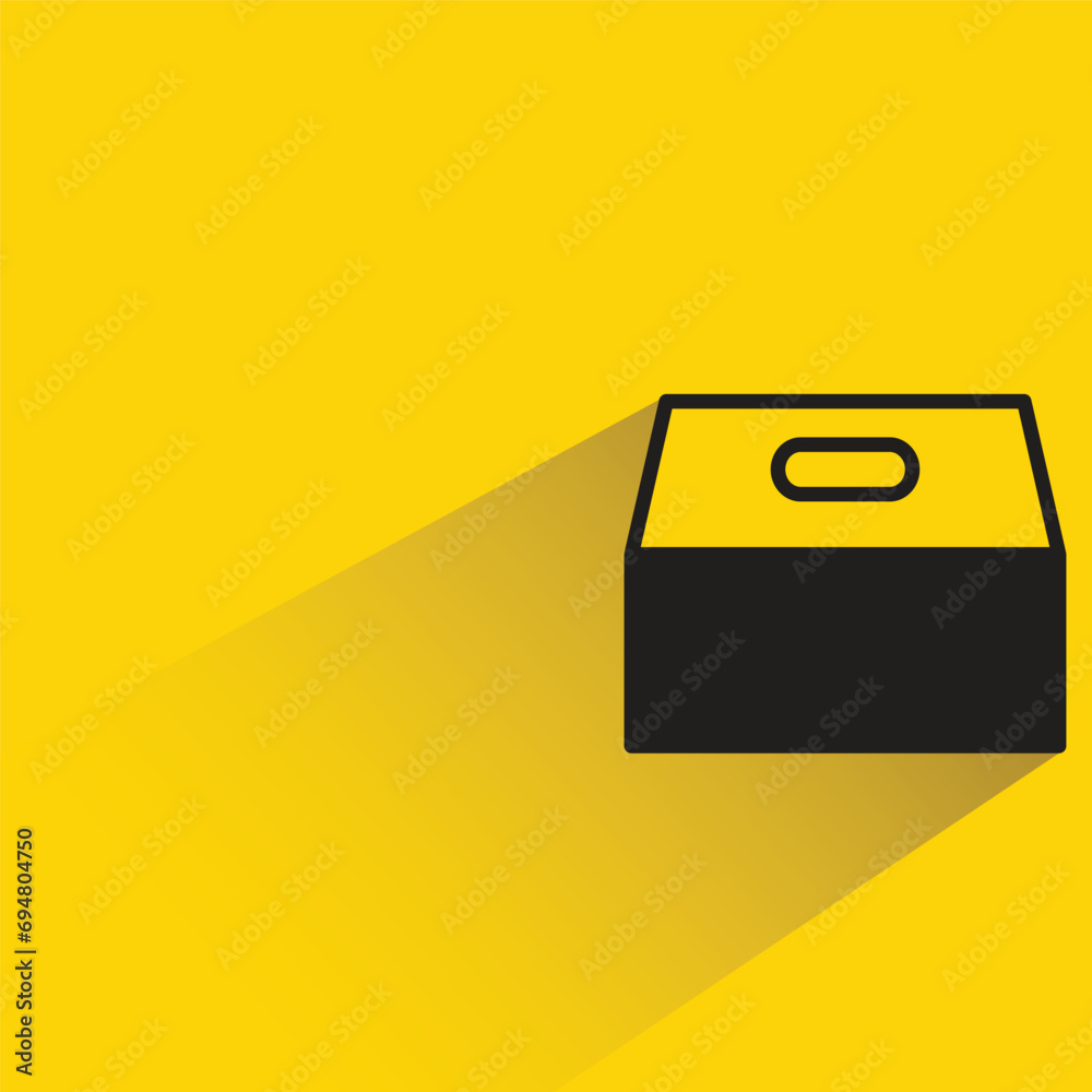 ballot box with shadow on yellow background ballot box with shadow on yellow background