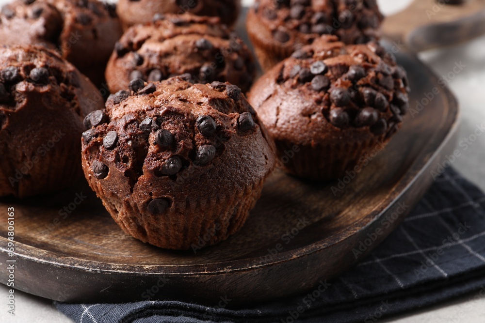 Fototapeta premium Tasty chocolate muffins on grey table, closeup