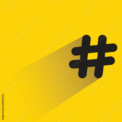 hashtag with shadow on yellow background