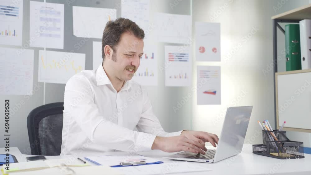 Happy businessman using laptop. Happy businessman using laptop.