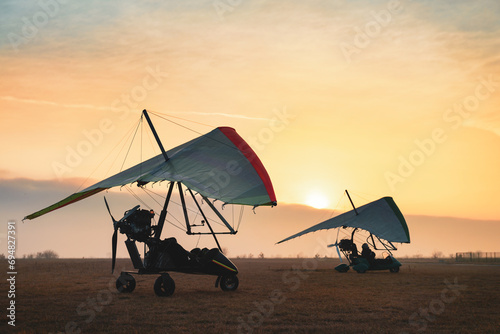 Hang glider trikes on the runway photo