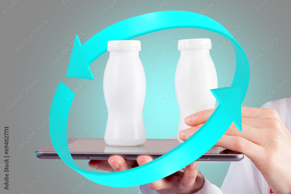 Probiotics for digestive system. Jars with bio additives on electronic tablet. Digestive system symbol near doctor hands. Yogurt to take care of digestion. Probiotics for taking care of body Probiotics for digestive system. Jars with bio additives on electronic tablet. Digestive system symbol near doctor hands. Yogurt to take care of digestion. Probiotics for taking care of body
