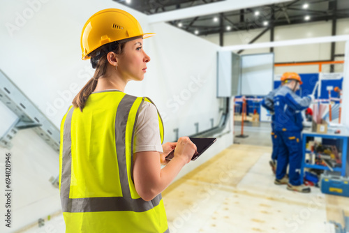 Woman engineer. Girl is emp...