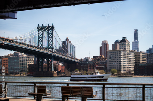 Elegant Manhattan Bridge stretching under clear blue sky photo