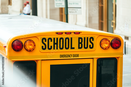 School bus outside brick building in Manhattan
