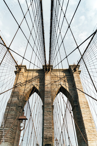 Iconic Brooklyn Bridge cables and pillars photo
