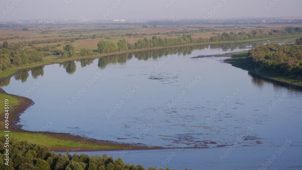Rural landscape with country houses. River in countryside in Foggy dawn, aerial view. River in morning mist sunrise. Rural landscape with country houses. River in countryside in Foggy dawn, aerial view. River in morning mist sunrise.