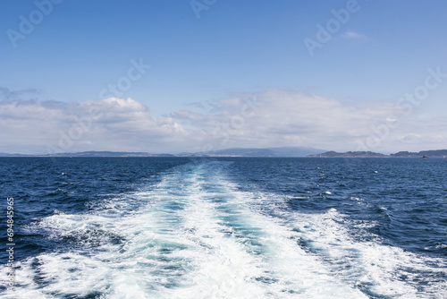 Idyllic view of wake is blue seascape at Cies Island photo