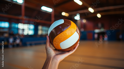 A Volleyball Ball In Hand 