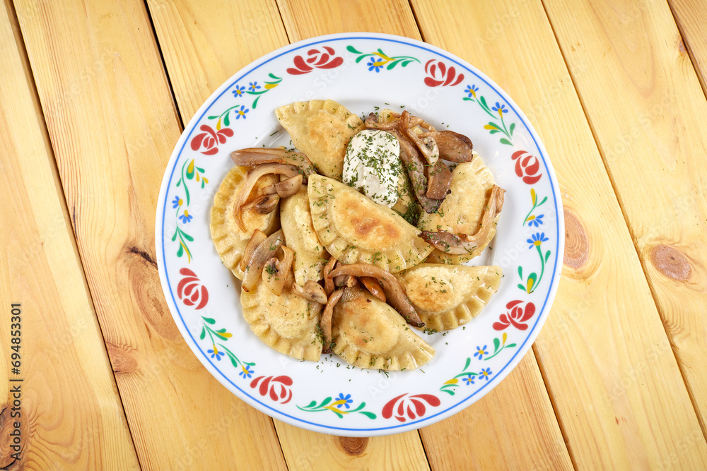 fried dumplings on the wooden background fried dumplings on the wooden background