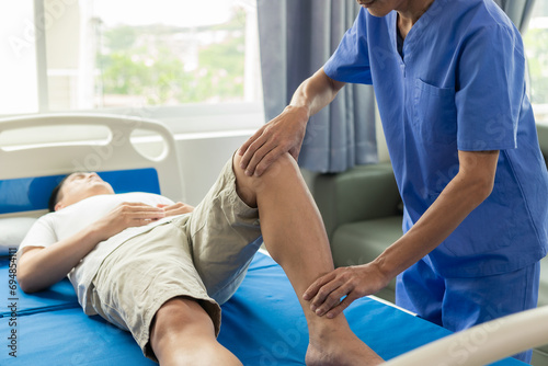 Physiotherapist working with patient in close clinic, physical rehabilitation, doctor giving advice to patient Ankle problems and flexor injuries photo