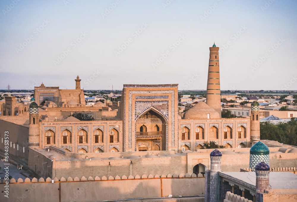 Mohammed Rakhim Khan Madrassah tiled with mosaics and ceramic tiles in the ancient city of Khiva in Khorezm, medieval architecture