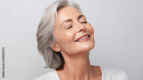 Timeless beauty gorgeous senior woman advertising anti-age lift products