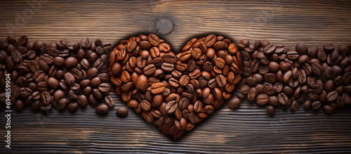Heart of Coffee Beans on Wooden Surface © ART_ist