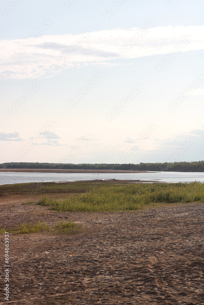 sandy uneven riverbank, in summer, sandy uneven riverbank, in summer,